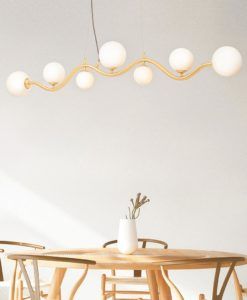 Lámpara lineal color oro UVA ambiente